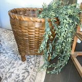 Basket with wooden feet