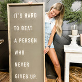 It's Hard to Beat a Person - 24x60 Sign - Charcoal Canvas